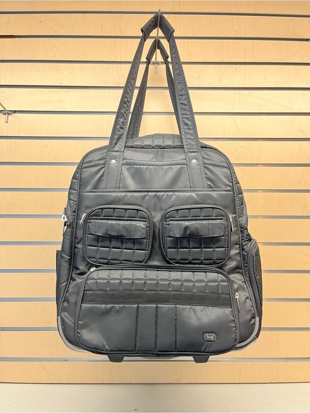 Lug Puddle Jumper wheeled travel backpack. Black. Extendable handle